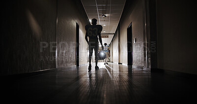 Buy stock photo Back, football and walking with man in stadium corridor for sports competition, match and game. Fitness, pro league player and athlete with person in tunnel for training, tournament and contest