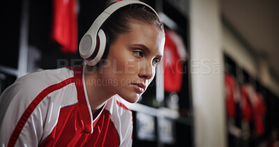 Buy stock photo Thinking, soccer and woman with headphones for music, audio and radio for training. Football, sports and person listening to track for exercise, fitness and workout for match, game and practice