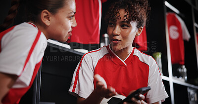 Buy stock photo Talking, smile and girls with smartphone, gym and conversation for match on website, watching and sports. Locker room, friends and people with mobile for streaming, scroll and preparing for game