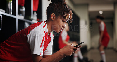 Buy stock photo Fitness, watching and woman with smartphone, locker room and browsing of video on social media and online. Happy, football player and person with mobile for streaming, healthy or girl with sportswear
