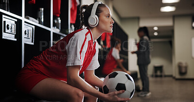 Buy stock photo Thinking, ball and soccer woman with headphones for music, audio and radio for training. Football, rest and person listen to track for exercise, fitness and workout for match, game and practice