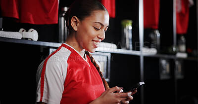 Buy stock photo Happy, soccer and woman with phone in locker room for social media, contact and online communication. Athlete, football and person on smartphone for match, training and sports tournament schedule
