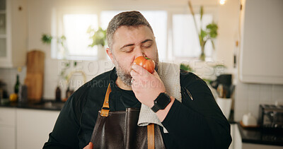 Buy stock photo Home, tomato and man in kitchen, chef and ingredients with expert, meal prep and cooking. Person, nutrition and entrepreneur with flavour, vegetable or lunch with recipe quality or culinary skills