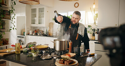 Buy stock photo Recipe, cooking and man with live streaming in kitchen for meal prep, filming tutorial or online culinary class. Food influencer, content creation or person with cuisine ingredients or dinner in home