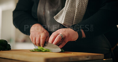 Buy stock photo Chef, hands and man in kitchen, cutting vegetables and nutrition with meal prep, culinary skills and ingredients. Closeup, home or expert with utensils, cook and chopping board with recipe or cuisine