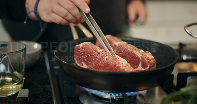 Buy stock photo Cooking, stove and hands of chef with meat in pan in kitchen for culinary skill, recipe and meal prep. Food, dinner and person with beef, steak and sauce for gourmet dish, ingredients and cuisine