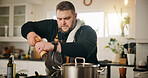 Man, chef and spices in kitchen for meal prep, diet and lunch or cooking. Recipe, cuisine and nutrition with food and gourmet skills at home for wellness, small business and healthy ingredients