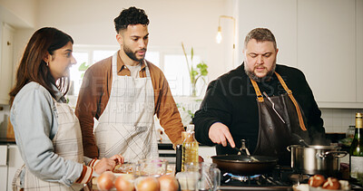 Buy stock photo Cooking, chef and couple with learning in kitchen for meal preparation, culinary course and recipe demonstration. Professional class, people and food lesson with dinner instructions or nutrition tips