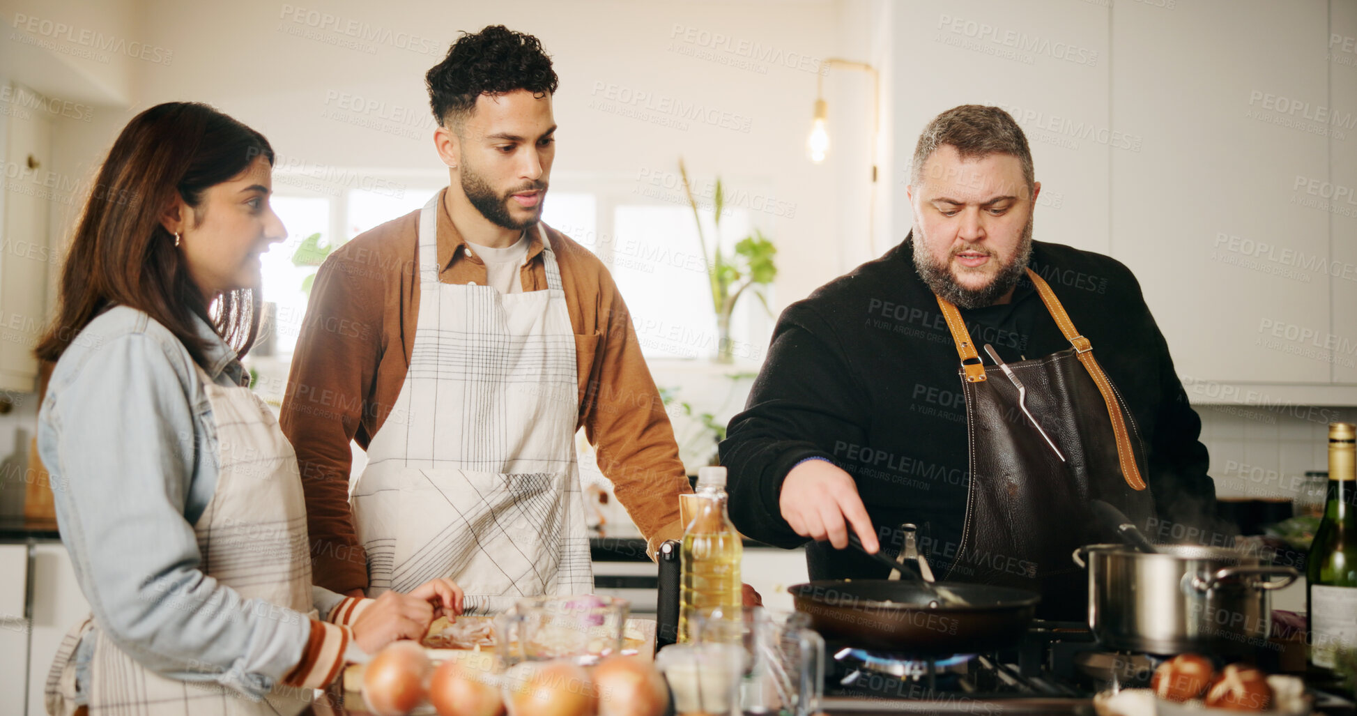 Buy stock photo Cooking, chef and couple with learning in kitchen for meal preparation, culinary course and recipe demonstration. Professional class, people and food lesson with dinner instructions or nutrition tips
