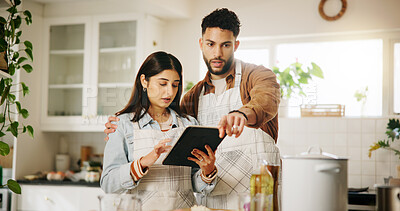 Buy stock photo Couple, tablet and cooking with kitchen, recipe and home with food ingredients and internet instructions. Technology, blog and preparation with chef people in apartment for diet, health or nutrition