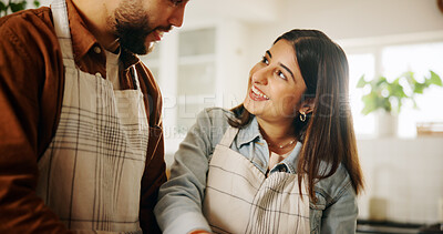 Buy stock photo Happy, cooking and couple in kitchen in home together for bonding, talking and connection. Conversation, helping and man with woman for preparing meal, food or dinner for health diet in apartment.