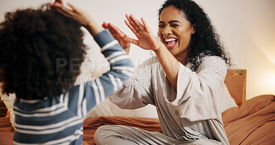 Buy stock photo Smile, mom and high five for child, bedroom and excited for fun in house, laughing and game with kid. Happiness, woman and playing with son in home, boy and bonding with mother in apartment or family
