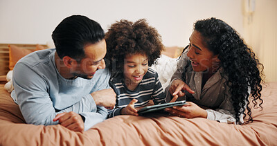 Buy stock photo Happy family, child and watching with tablet on bed for online entertainment, cartoon or movie at home. Mom, dad and kid with smile, technology or app for fun subscription, game or shows in bedroom