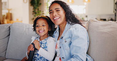 Buy stock photo Mom, girl and happy for watching tv on sofa with remote control for movie, hug or bonding with love. Child, mother and daughter with smile, care or laugh on couch for streaming film in family home