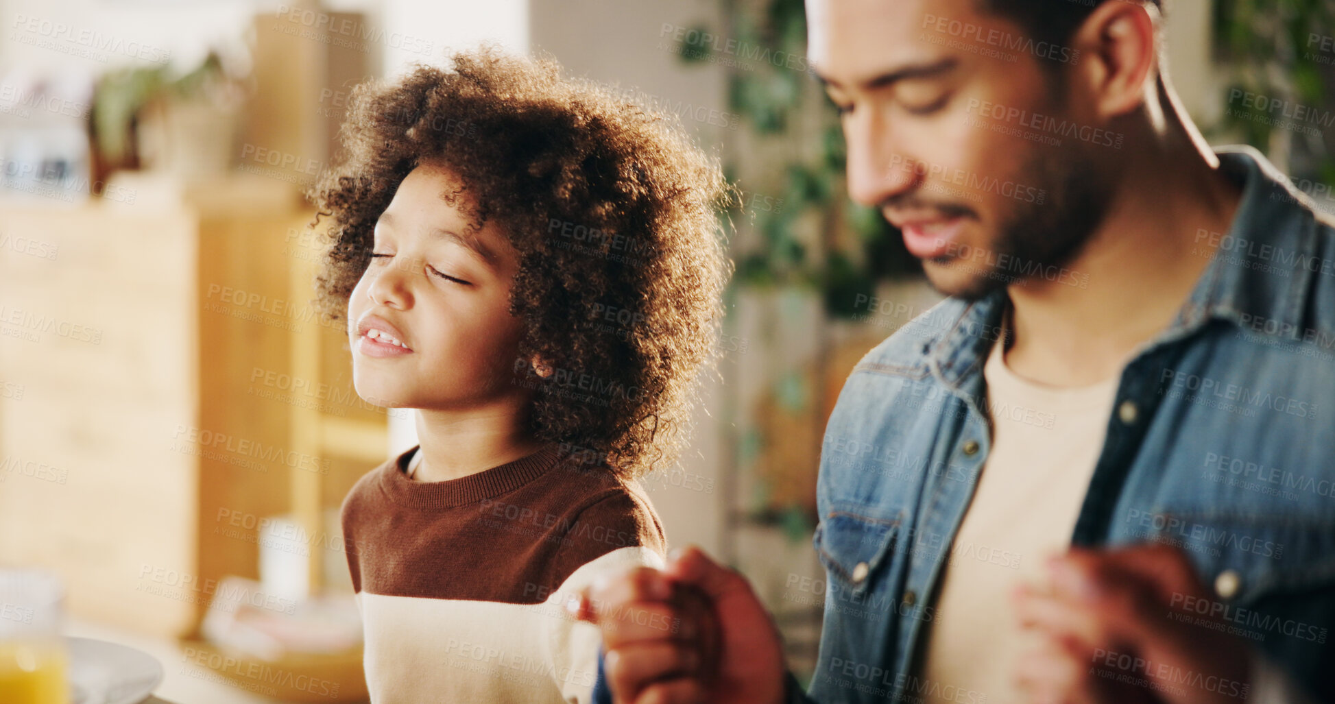 Buy stock photo Dinner, father and child holding hands with prayer in home for grace, worship and thankful for food. Spiritual family, people and grateful for lunch with thanksgiving, religious and praise together