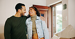 Couple, hug and moving in with new home, laughing and finance investment together. Excited man, woman and smile with property, real estate or house for mortgage loan, renovation or relocation success