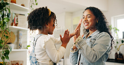 Buy stock photo Fun, game and hands with mother, girl and kitchen of home together for bonding. Laughing, love and smile with single parent, woman and daughter playing in apartment for motor skills development