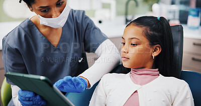 Buy stock photo Clinic, child and dentist with tablet for consultation, dental education and information in healthcare. Discussion, girl patient and orthodontist with digital for teeth procedure, checkup and results