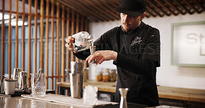 Buy stock photo Cocktail, mixology and bartender man with bottle, jigger or tools for artisan beverage recipe. Cafe, small business pub and barman at counter with happy hour drinks, process or craft alcohol in glass