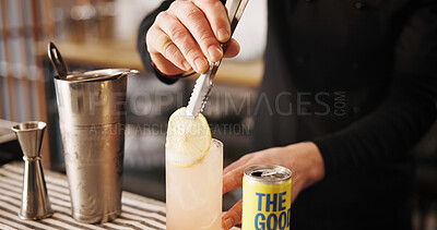 Buy stock photo Cocktail, mixology and hands of bartender with lemon, glass and tools for artisan beverage recipe. Cafe, small business pub and person at bar counter with happy hour drinks, process and craft alcohol