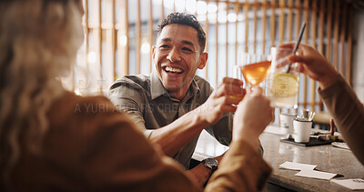 Buy stock photo Restaurant, cocktails and friends with drink toast for social gathering, event and party. Bar, cheers and group of men and women with alcoholic beverage for holiday, celebration and weekend fun
