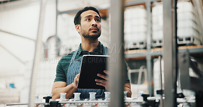 Buy stock photo Distillery, tablet and man in factory thinking for alcohol production, manufacturing or distribution. Brewery, industrial inspection and person on tech for fermentation, quality control and storage