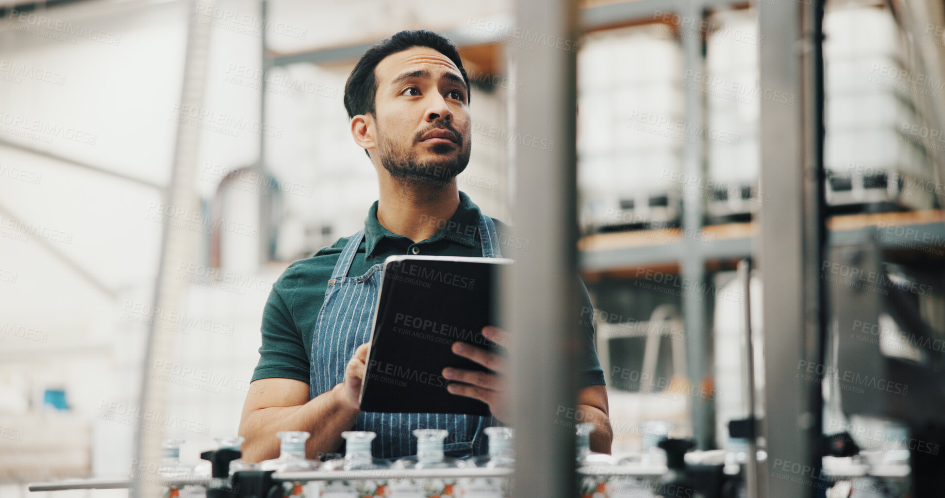 Buy stock photo Distillery, tablet and man in factory thinking for alcohol production, manufacturing or distribution. Brewery, industrial inspection and person on tech for fermentation, quality control and storage