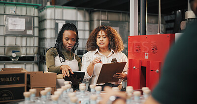 Buy stock photo Distillery, check and inspection with women in factory for packaging, drink production and bottle checklist. Manufacturing, inventory and distribution with people in warehouse for quality control