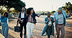 Business people, smile and dancing in city, celebration and morning commute with profit growth. Group, outdoor or employees in street, investment deal or positive feedback with achievement or success