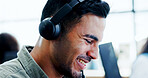 Contact us, headset and smile of man in call center for assistance, communication or help. Business, consulting and customer service with happy employee in agency workplace for virtual support