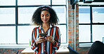 Creative agency, businesswoman and smile with smartphone for message, online news and contact in office. Workplace, female person and worker on break with digital, blog application and social media