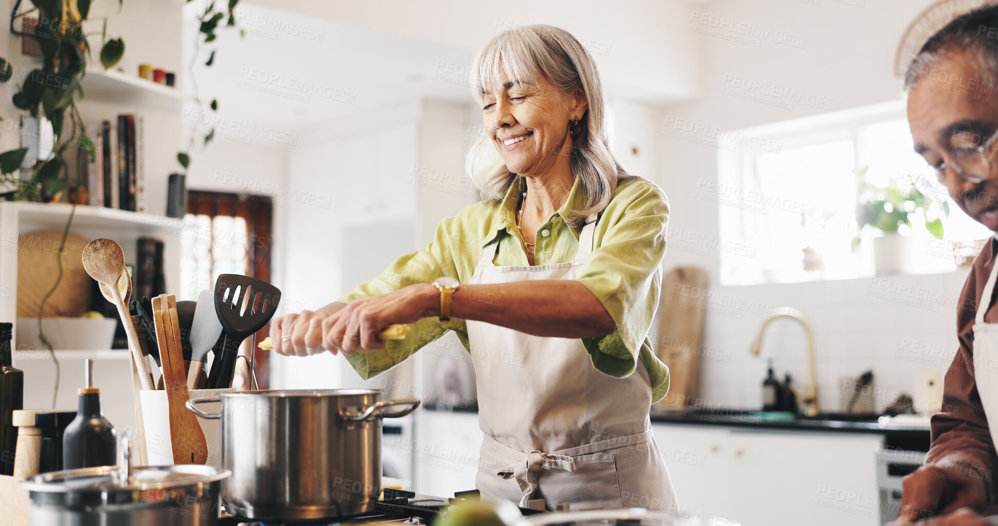 Buy stock photo Pasta, cooking and mature couple in kitchen in home with Italian dinner, meal or dish. Happy, pot and man with woman for preparing supper with health, wellness and nutrition in house together.