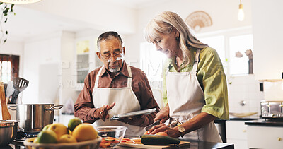 Buy stock photo Tablet, cooking and couple in kitchen in home with recipe for dinner, meal or dish. Digital technology, ingredients and mature man with woman for preparing supper with food tutorial together in house