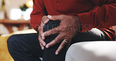 Buy stock photo Hands, injury and knee pain with mature person on sofa in living room of home for arthritis. Accident, emergency or joint inflammation and senior in apartment with osteoarthritis or tendinitis