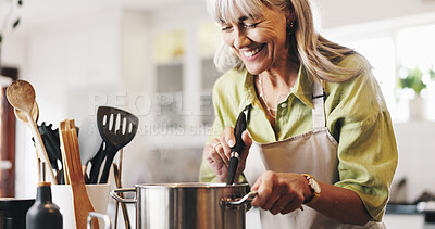 Buy stock photo Scent, cooking and mature woman in kitchen in home with smelling dinner, meal or dish. Happy, pot and female person with satisfaction for aroma of supper with health, wellness and nutrition in house.