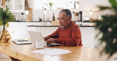 Buy stock photo Senior man, laptop and taxes in kitchen with typing, documents and financial review for pension. Elderly person, computer and paperwork with budget, will and planning for retirement income in home