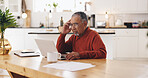 Senior man, laptop and finance with stress in home, documents and review for pension funding. Elderly person, computer and paperwork with budget, confused or planning for retirement income in kitchen