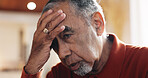 Senior, man and thinking with headache in home for retirement debt, decision mistake or pressure. Elderly person, overthinking and tension migraine with mental health, overwhelmed or financial crisis