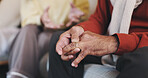 Elderly couple, ring or hands in home for conflict, regret or doubt in marriage with partner. Senior man, wedding band or fidget with anxiety for divorce, argument or strain in relationship with wife