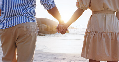 Buy stock photo Holding hands, love and closeup of couple on beach for sunset, romance and support on vacation. Ocean, people and adventure with connection for commitment, care and holiday together on island