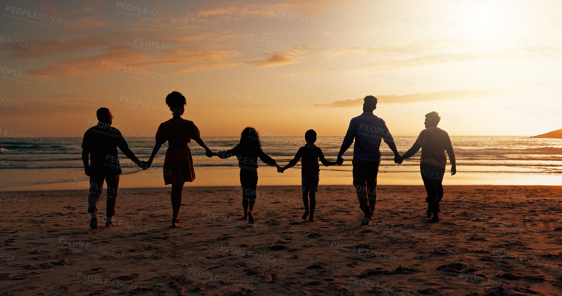 Buy stock photo Big family, sunset and holding hands with kids on beach of summer holiday, travel and bonding together. Space, back and view of people for ocean journey of getaway, tropical vacation and relationship
