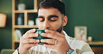 Home, sofa and man with coffee for smell, warm beverage and espresso in living room on weekend. House, male person and relax with aroma for matcha drink, tea cup and comfortable on couch in lounge