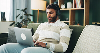 Buy stock photo Headphones, typing and man with laptop for remote work, audio and copywriter editing ad campaign in home. Living room, computer and happy freelancer with music for content writer with article or blog