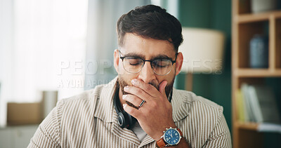Buy stock photo Man, yawn and tired with headset in home for remote work, consulting or technical support in morning. Person, agent and exhausted with burnout, fatigue and overworked with voip for job at apartment