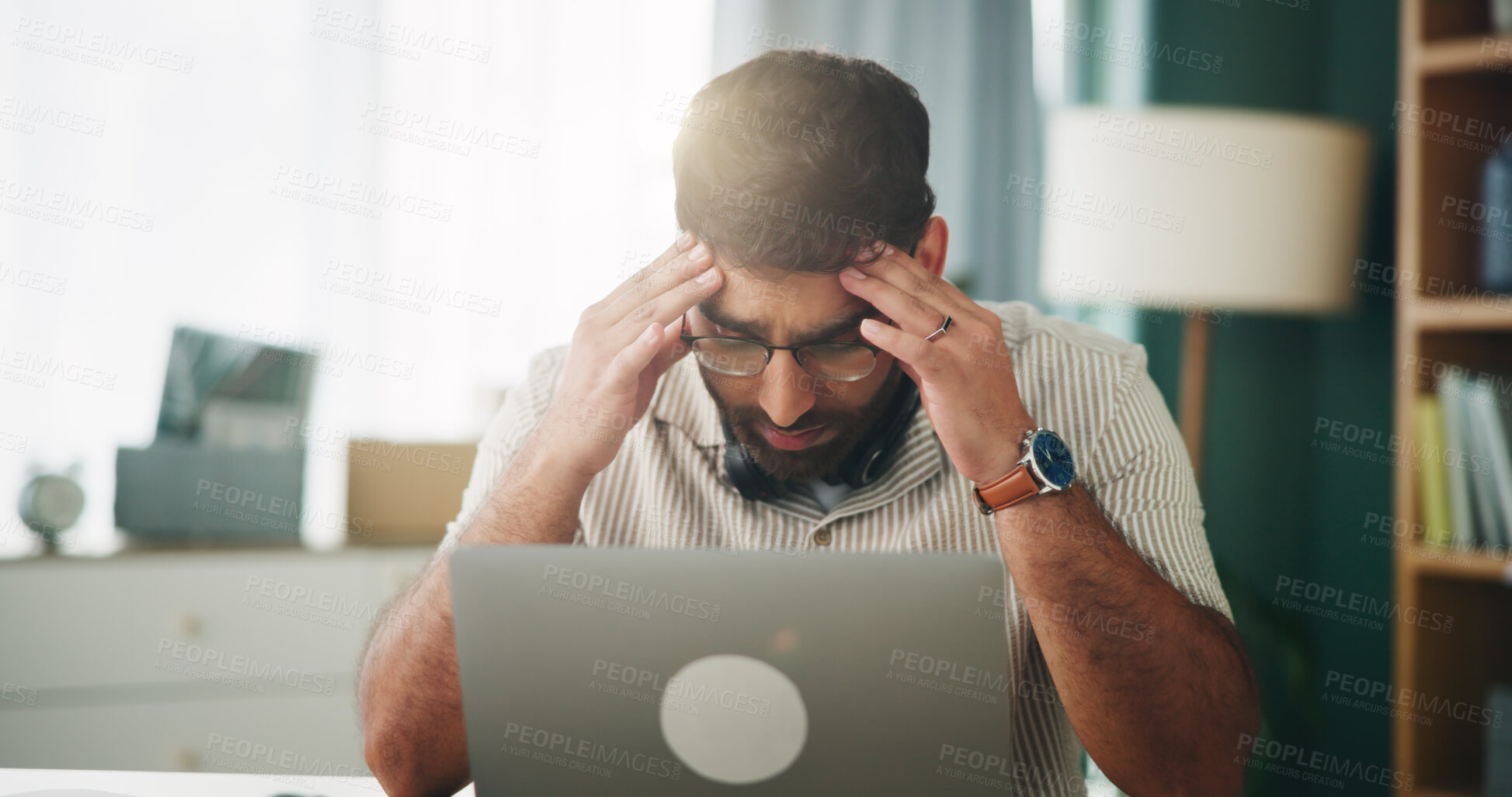 Buy stock photo Remote work from home, headache and man with laptop, fatigue and overwhelmed with deadline. Person, freelancer and entrepreneur with computer, burnout and exhausted with migraine, tired or low energy