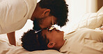 Relax, couple and forehead kiss in bedroom, home and bonding for relationship, commitment and apartment. Resting, man and affection for woman, happy people and smile for romance in morning or love