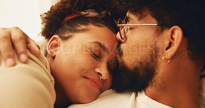 Buy stock photo Relax, couple and forehead kiss in home, love and bonding for relationship, commitment and apartment. Resting, man and affection for woman, happy people and smile for romance in morning or care