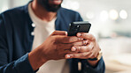 Businessman, hands and mobile in office for contact, calendar update or scroll on networking platform. Employee, phone and typing in agency for communication, email draft or browsing for productivity