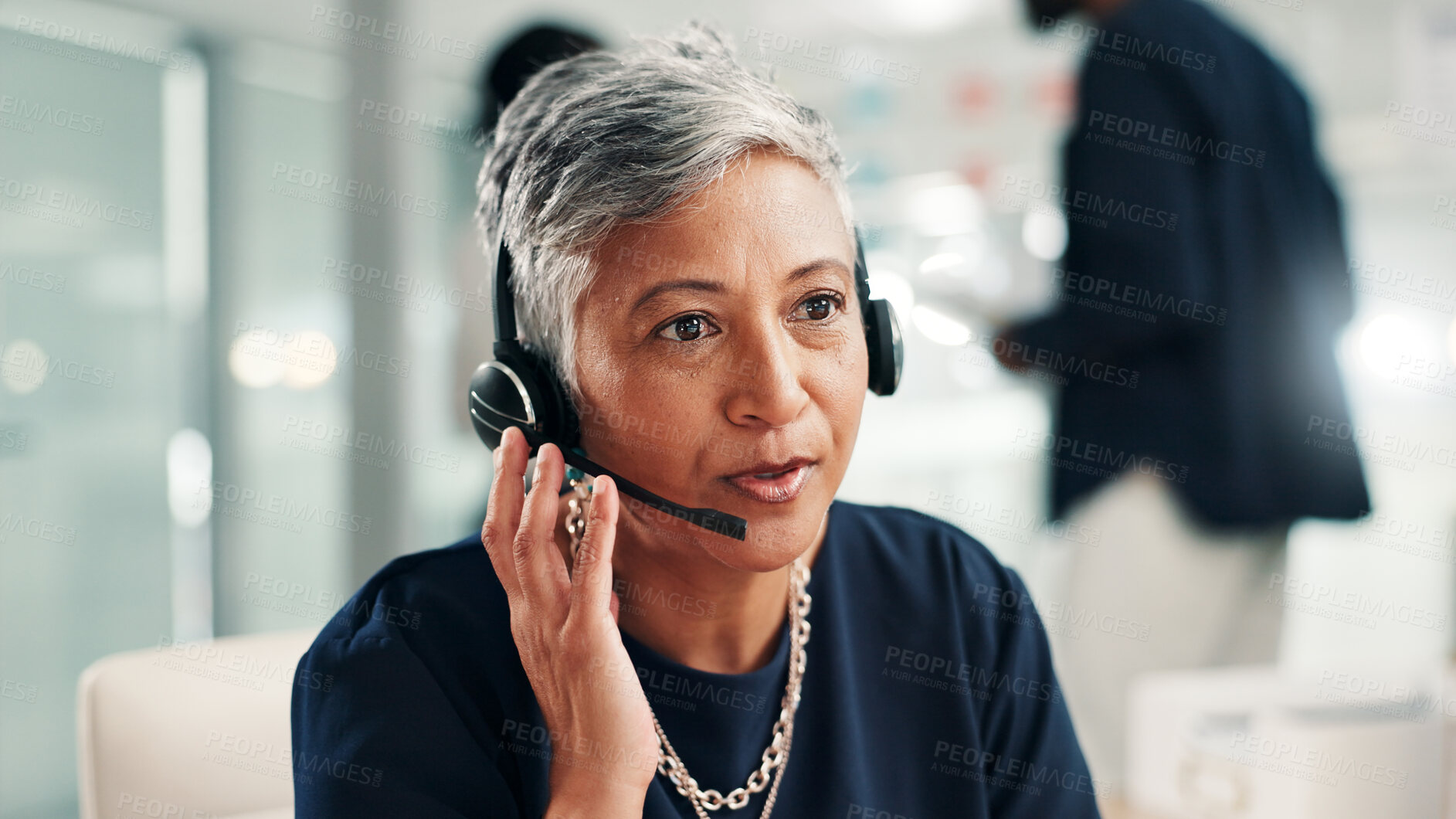 Buy stock photo Mature woman, consultant and talking with headset at call center for online communication. Female person, agent or employee speaking with mic or technology for virtual assistance or help at office