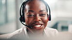 Happy, black woman and agent with headset at call center for online communication or customer service. Female person, consultant or smile with technology, mic or help for virtual assistance at office